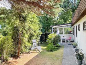 Zahrada ubytování Holiday home HUNVIGAN + 10 fotografií
