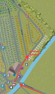 a map of a parking lot with red arrows at 5 mins walk to beach. 3 bedroom caravan. Sleeps 8 in Clacton-on-Sea