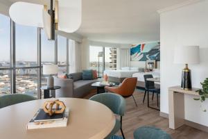 a hotel room with a view of a living room at Miami Marriott Biscayne Bay in Miami