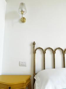 A bed or beds in a room at B&B ISOLA Messina