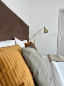 Ein Bett oder Betten in einem Zimmer der Unterkunft National Plus