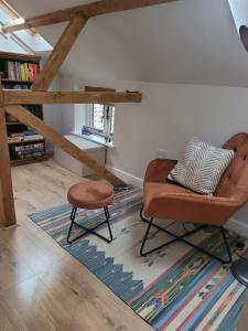 Entire 2 bed coach house in peaceful Norfolk villageにあるシーティングエリア