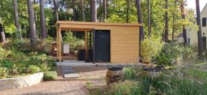 Corne-BicheにあるMaison Daubignyの庭小屋