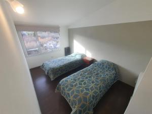 Кровать или кровати в номере Mantra