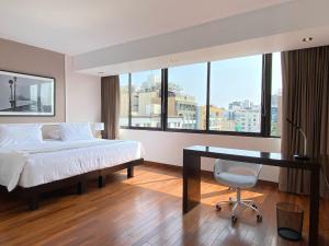 Voodi või voodid majutusasutuse Modern Penthouse & 2BR in Miraflores by Wynwood House toas +70 fotot