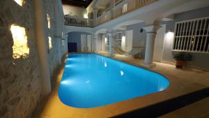 Bazén v ubytování Hotel Casa Cytia nebo v jeho okolí
