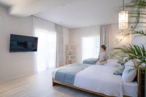 Postel nebo postele na pokoji v ubytování NEWOPEN Villa lanikai