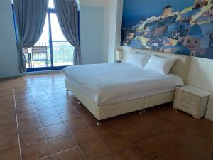 Voodi või voodid majutusasutuse Fuyue Sea View B&B toas