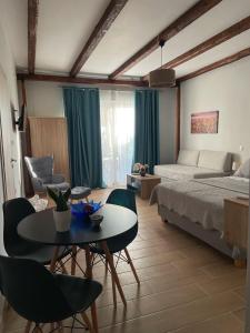 Ένα ή περισσότερα κρεβάτια σε δωμάτιο στο Giasemi apartments