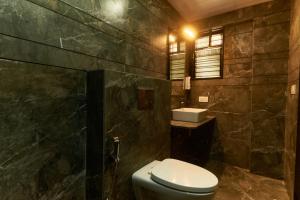 Koupelna v ubytování Hotel Anand Heritage + 37 fotografií