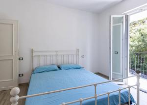 Postel nebo postele na pokoji v ubytování Gelso