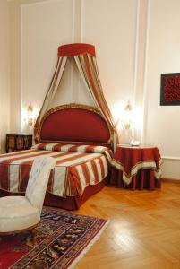 Postel nebo postele na pokoji v ubytování Park Hotel Villa Potenziani
