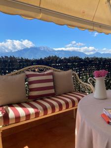 a bench sitting on top of a table with a view at NoVel 1 Luxury apt Katerini in Katerini