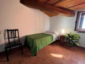 Ένα ή περισσότερα κρεβάτια σε δωμάτιο στο Agriturismo Difesa del Monte