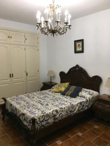 Postel nebo postele na pokoji v ubytování Casa Rural Casa Maria Camuñas