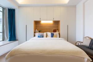 Un pat sau paturi într-o cameră la King'sLandind BnB