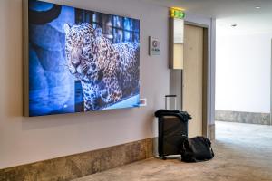 TV a/nebo společenská místnost v ubytování Mercure Hotel Berlin City