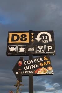 a sign for a coffee and wine bar at D8 B&B in Zadar