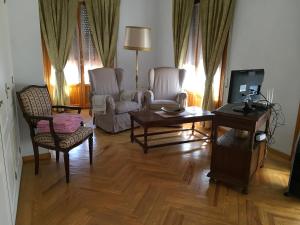 TV a/nebo společenská místnost v ubytování Casa Rural Casa Maria Camuñas