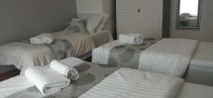 Ένα ή περισσότερα κρεβάτια σε δωμάτιο στο Apartman Magnolija
