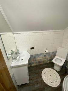 a bathroom with a sink and a toilet at Tomashchuk resort in Vorokhta +27 photos