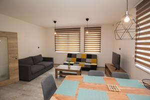 Area soggiorno di Apartmán Devítka Resort pod Špičákem
