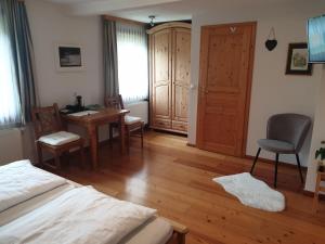 Posteľ alebo postele v izbe v ubytovaní Bergführerhaus
