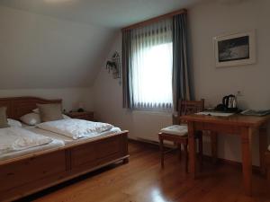 Posteľ alebo postele v izbe v ubytovaní Bergführerhaus