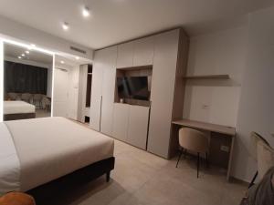 Postel nebo postele na pokoji v ubytování APARTMENT ANDROMEDA