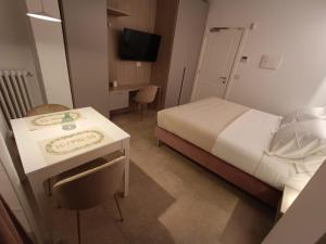 Postel nebo postele na pokoji v ubytování APARTMENT ANDROMEDA