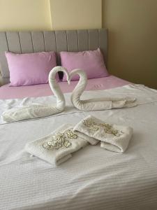 Postel nebo postele na pokoji v ubytování Olea Bahçeli