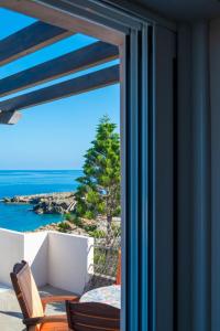 a room with a view of the ocean at Naiada Stomio-B apartment in Katsímbalis