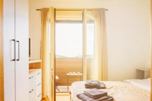Krevet ili kreveti u jedinici u okviru objekta Apartman Mima Divcibare