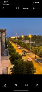 a view of a street with cars and street lights at Atico Canet de Berenguer in Canet de Berenguer