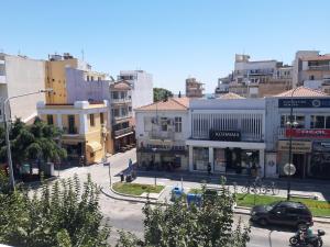 a view of a city street with buildings at Central AXD in Alexandroupoli