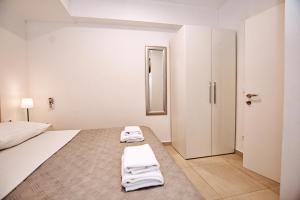 Posteľ alebo postele v izbe v ubytovaní CentRooms Kovac1