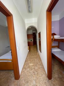 A bed or beds in a room at Teen Hub