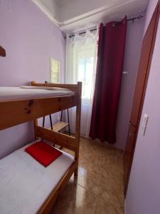 A bed or beds in a room at Teen Hub