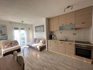 Kuchyň nebo kuchyňský kout v ubytování Apartment Veronika + 20 fotografií