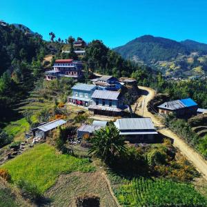 an aerial view of a village on a hill at Mount Mahabharat Homestay in Panauti