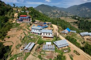 an aerial view of a house on a hill at Mount Mahabharat Homestay in Panaoti