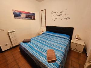 En eller flere senge i et værelse på La casetta di Francesco - Relax - Mare - Treno 20' Roma