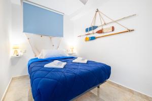 En eller flere senge i et værelse på Eurotennis Paradise Beach Apartments + 45 billeder