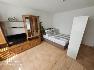 Postel nebo postele na pokoji v ubytování Ferienwohnung Groitzsch