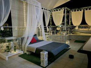 เตียงในห้องที่ Delphitea Philoxenia