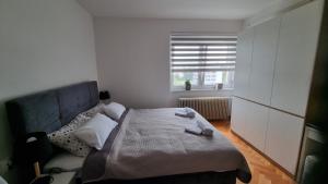 Ένα ή περισσότερα κρεβάτια σε δωμάτιο στο Apartman Nora +37 φωτογραφίες