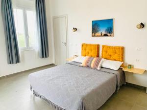 Postel nebo postele na pokoji v ubytování Ca' Salino