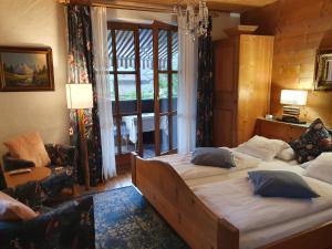 Łóżko lub łóżka w pokoju w obiekcie Appartement Pension Bäckenhäusl FERIENWOHNUNGEN Chalets Hütten Komfortzimmer