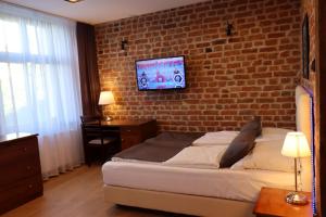 Μια τηλεόραση ή/και κέντρο ψυχαγωγίας στο APARTAMENT PRZY RYNKU
