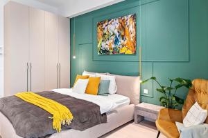 Postel nebo postele na pokoji v ubytování Floreasca Apartament on Business Centre